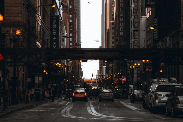 A city street at dusk — the kind of block PadPipe measures walking times from.